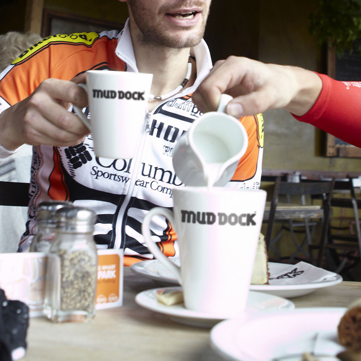 Cyclists enjoying coffee at Mud Dock